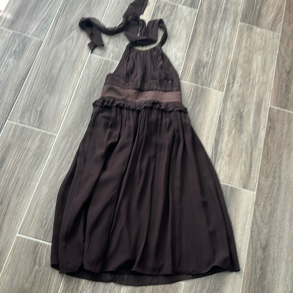 Georgeous brown cocktail dress. Backless. By BCBG size 6.